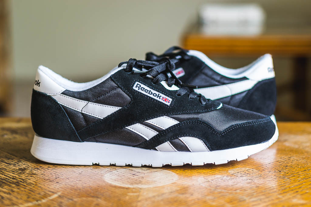 reebok classic black on feet