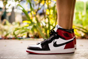 Nike Air Jordan 1 Retro High OG Black Toe on feet