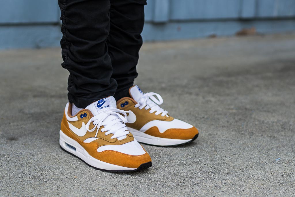 air max 1 red curry on feet