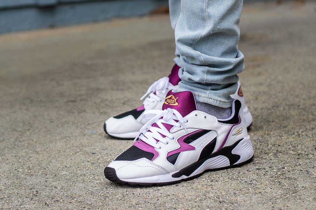 puma sneakers on feet