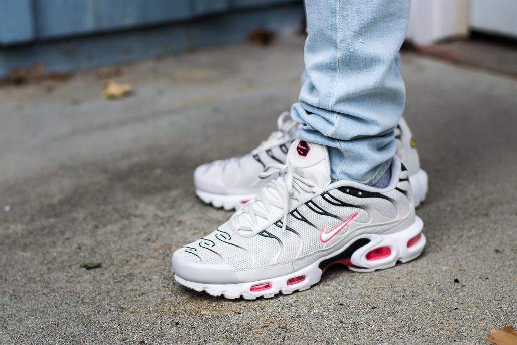 air max plus black on feet