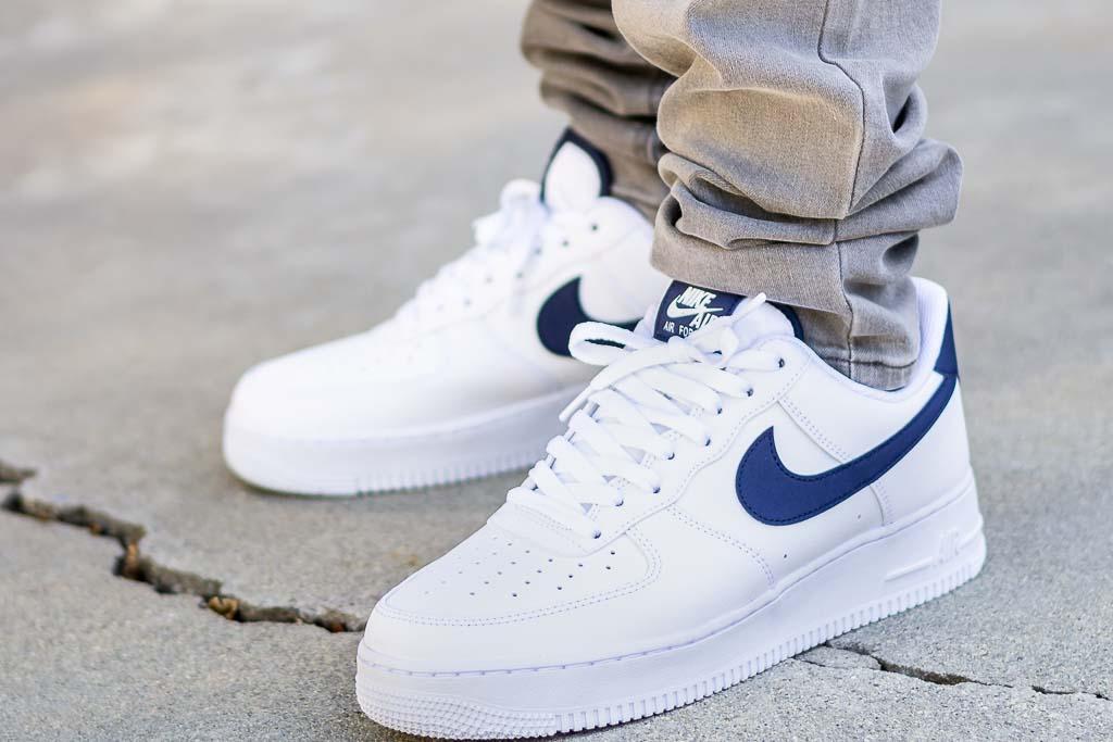 white air force ones on feet